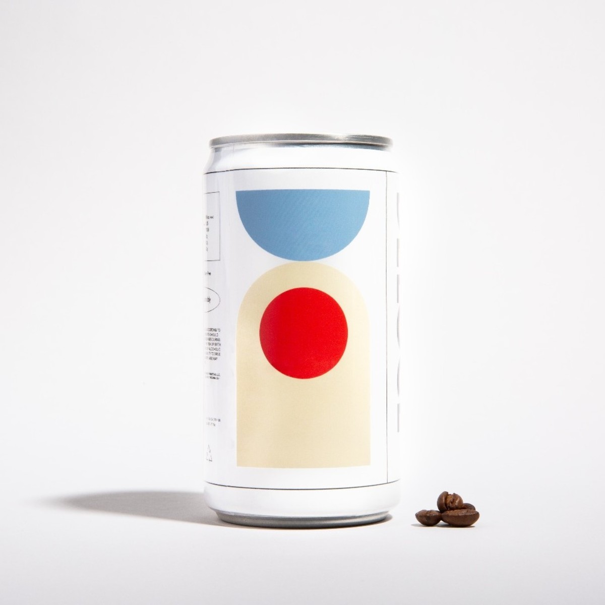 Deloce Espresso Martini can next to espresso beans